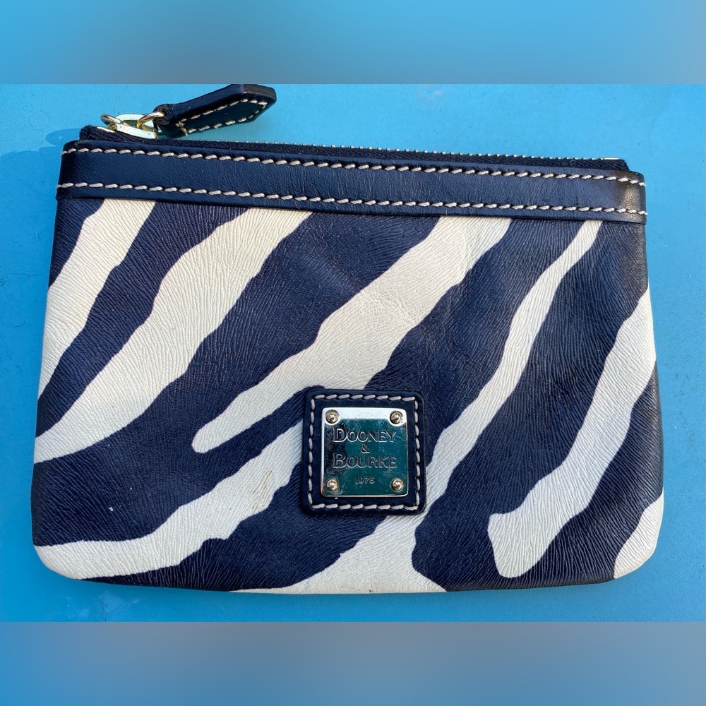 Animal print zip purse Dooney & Bourke